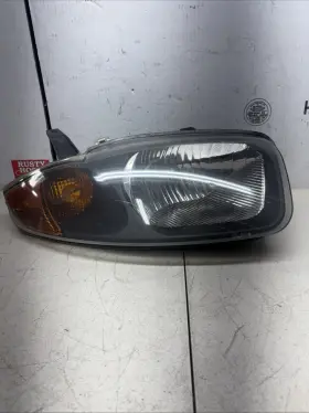 165-31592b Chevrolet 2004 Cavalier Right Side Passenger Headlight