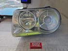 2005-2007 Chrysler 300 Driver Side Headlight Halogen With Projector 04805863AH Used. Price: $68.64.