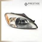 2000-2007 Ford Taurus Headlamp Headlight Right 1F1Z-13008-AA Used. Price: $85.00.