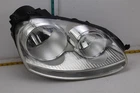2005-2010 Volkswagen Jetta Right Passenger Side Headlight Assembly Used. Price: $69.99.