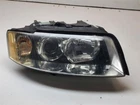 2002-2003 Audi A4 Right Side Halogen Headlight Assembly Oem Used. Price: $100.00.