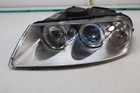 2004-2007 Volkswagen Touareg Front Left Driver Side Headlight 7L6941015CK Oem Used. Price: $279.97.