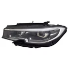 New Aftermarket Driver Side Headlight Assembly 63118496159. Price: $1409.35.