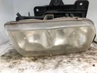 1999-2000 Cadillac Escalade Passenger Headlight Oem 15738658 Front Used. Price: $90.00.