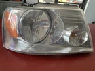 Ford F-150 Right Headlight Assembly 44ZH-164 Oc Used. Price: $44.95.