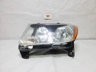 2011 Jeep Compass Headlight Halogen Lamp Left Driver Side Oem 68088869AA Used. Price: $118.99.
