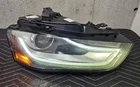 2013-16 Audi Allroad Genuine Right (passenger Side) Bi-xenon Headlight Used. Price: $350.00.