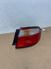 1999 To 2000 Mazda Millenia Right Passenger Side Tail Light AD6518 Dg Used. Price: $29.95.