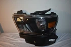 Dodge Ram 1500 Headlight Left 2019-2023 Oem 68316087AJ Used. Price: $198.00.