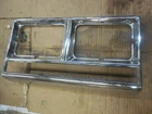 1983-1989 Chrysler New Yorker Left Driver Headlight Bezel Trim Surround 4103616 Used. Price: $32.00.