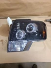 Driver Headlight Halogen Black Border Trim Fits 10-14 Ford F150 Pickup 1974532 Used. Price: $126.30.
