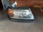 Passenger Headlight Color-keyed Bezel Fits 00-04 Montero Sport 244132 Used. Price: $113.99.