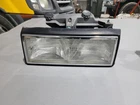 91-93 Cadillac Deville Fleetwood Left Lamp Bracket & Trim Used. Price: $110.00.