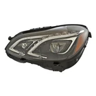 New Led Driver Side Headlight Lens Housing 2128202739. Price: $1732.58.