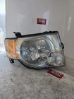 2011 Ford Escape Passenger Side Headlight 9L84-13005-A Used. Price: $60.00.