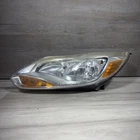 2012-14 Ford Focus Left Driver Headlight Halogen Oem BM51-13W030-F Used. Price: $65.00.