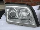 94-02 Mercedes R129 SL500 Right Headlight Xenon 1298208861 Oem Silver Arrow Used. Price: $850.00.