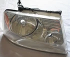 Oem 2004 2008 Ford F150 Right Passenger Side Headlight 4L34-13005-A Used. Price: $59.99.