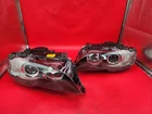 2004-2006 Bmw E46 325CI 330CI Headlights Lh Rh Pair Set Hid Xenon Adaptive Remanufactured. Price: $950.00.