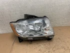 2011-2013 Jeep Grand Cherokee Right Passenger Halogen Headlight AA9550 Dw Used. Price: $46.53.