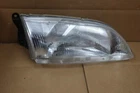 98 99 Mazda 626 Right Passenger Side Headlight Oem MA2503115R Used. Price: $56.00.