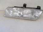 Saturn Series 1991-1995 Fixed Composite Lh Headlight Assembly W/ Mount Bracket Used. Price: $70.50.
