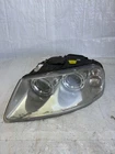 2002-07 Volkswagen Touareg Drivers Side Headlight 7L6941015A Used. Price: $86.89.