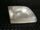 97 Ford F150 Passenger Side Headlight Used. Price: $37.25.