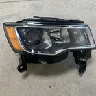 2017-2021 Jeep Grand Cherokee Headlight Oem Right Passenger Side Halogen T77623B Used. Price: $200.00.