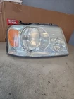 2007 Ford F-150 Right Passenger Side Headlight Assembly 4L3X-13005-A Used. Price: $40.00.