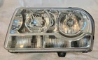 Depo 333-1171L-AC Chrysler 300 Driver Side Replacement Headlight Assembly Lh Used. Price: $50.00.