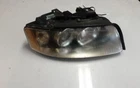 03 04 Audi A4 Rh Headlight Halogen Used. Price: $100.00.
