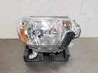 2013 Toyota Tacoma Oem Passenger Right Headlight Used. Price: $119.00.
