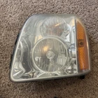 2007-14 Gmc Yukon Left Driver Side Front Headlight, Oem 15861025 Used. Price: $29.00.