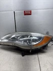 11-14 Chrysler Lh Headlamp Assembly Chrome Bezel 05182591 Used. Price: $60.00.