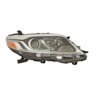 TO2519154 New Replacement Passenger Side Hid Headlight Lens/housing. Price: $352.00.