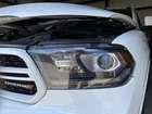 Driver Headlight Halogen Black Bezel Fits 14-20 Durango 1940486 Used. Price: $245.00.
