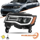 Xenon Black Headlight Assembly For 2017-2021 Jeep Grand Cherokee Driver Left New. Price: $178.99.