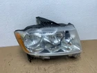 2011-2013 Jeep Grand Cherokee Right Passenger Halogen Headlight AC4104 Dw Used. Price: $44.50.