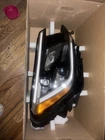 Genuine Volkswagen Headlamp Assembly 3CN-941-082-L Used. Price: $280.00.
