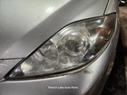 Driver Left Headlight Halogen Fits 06-07 Mazda 5 1299789 Used. Price: $75.00.