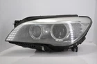 09-15 Bmw 750LI Left Driver Side Headlight Dynamic Xenon Hid LAMP7348511 Oem Used. Price: $269.99.