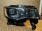 T77623B Jeep Grand Cherokee Right Headlight (used). Price: $175.00.