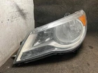 Fits 2009 Volkswagen Routan Left Headlight Assembly OEM:05113439AD Used. Price: $114.70.