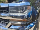 2016 Chevrolet Silverado 1500 Left Driver Headlight Assembly - Used, Tabs Broken. Price: $380.00.