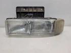 1995-05 Chevrolet Astrovan Driver Left Headlight W/ Bracket Used. Price: $48.94.