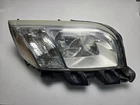 2006 - 2009 Mitsubishi Raider Passengers Headlight Assembly (oem) 55077744AC Used. Price: $299.99.