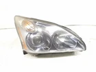 2008 Lexus RX400H Passenger Headlight Lamp - Broken Upper Tabs Used. Price: $411.08.