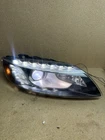 2010-2015 Audi Q7 Headlight Assembly Xenon Hid Right Passenger Bracket (read) Used. Price: $200.00.