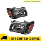 Pair Of Headlight Assembly For 01-04 Toyota Tacoma Black Housing Amber Reflector New. Price: $67.99.